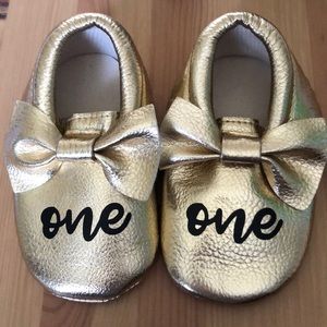 Gold “first birthday” shoes